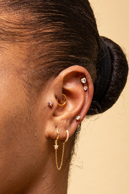 AURORA – Piercing étoile en titane ASTM F136 hypoallergénique - Much Elegance