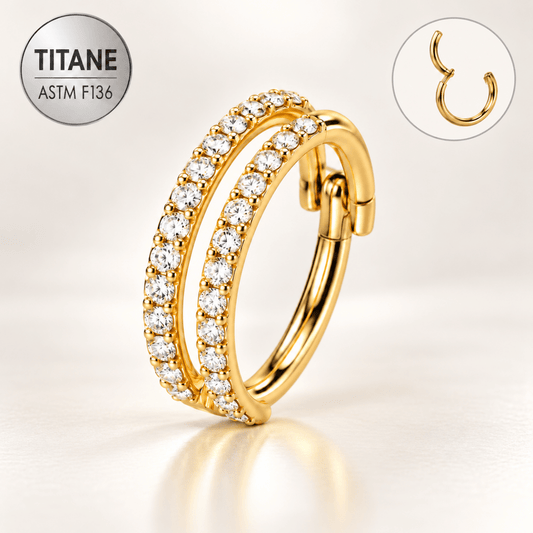 Piercing anneau double rang SOLÉNA doré PVD en titane ASTM F136 serti de pierres